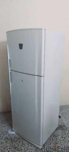 sharp fridge for sale very good condition and working 0