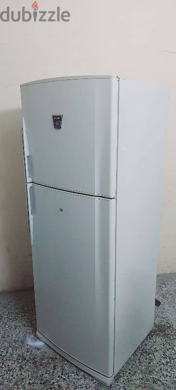 sharp fridge for sale very good condition and working 1