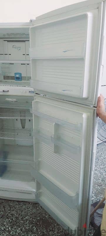 sharp fridge for sale very good condition and working 2