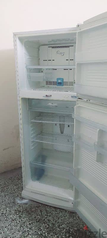 sharp fridge for sale very good condition and working 3