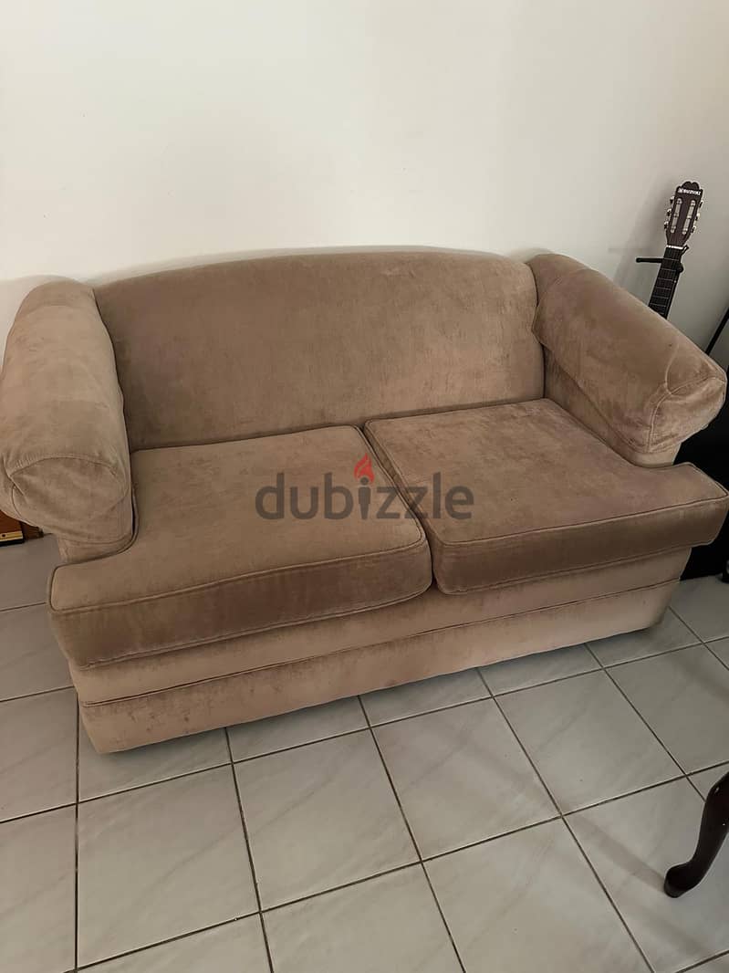 2 Seater sofa in good clean condition 0