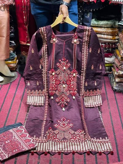 we are selling Pakistani fancy full embroidery stitched dresses .