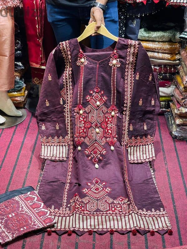 we are selling Pakistani fancy full embroidery stitched dresses . 0