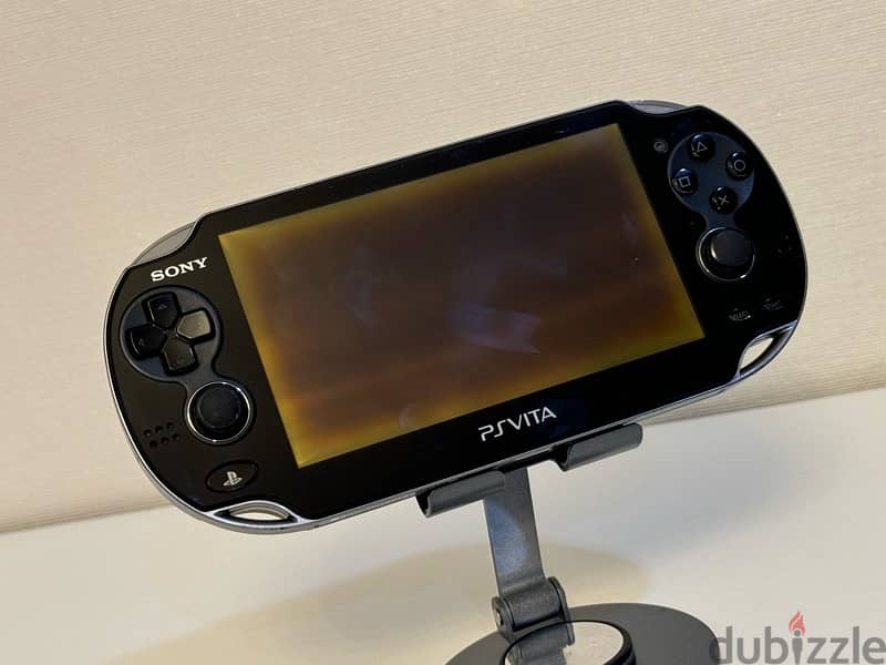 sony psvita 1000 oled model 64gb memory, 30 games 7