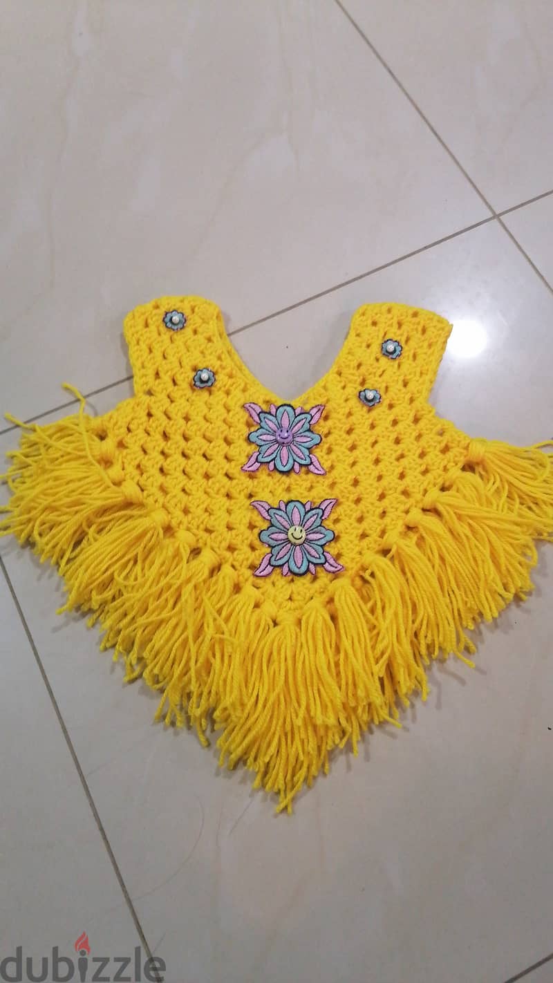 Crochet frocks and fabric clothes 11