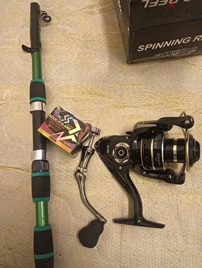 7000spining reel with stick full new condition