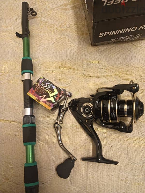 7000spining reel with stick full new condition 0