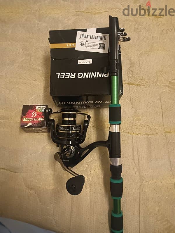 7000spining reel with stick full new condition 3