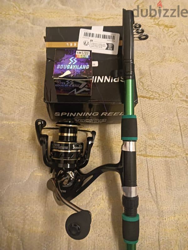 7000spining reel with stick full new condition 4