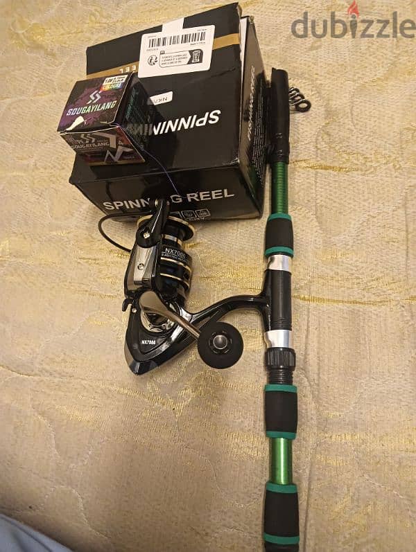 7000spining reel with stick full new condition 5