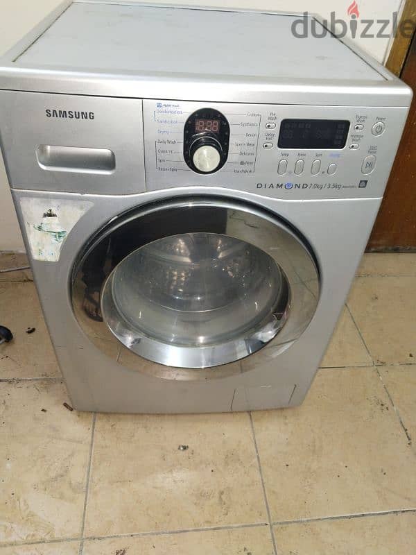 SAMSUNG FRONT LOAD WASHER WITH DRYER 0