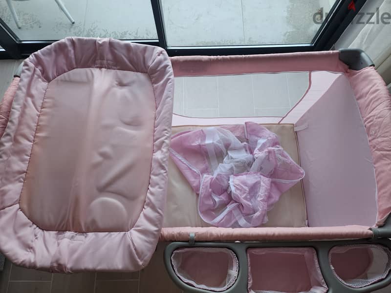 10 BD- pink travel cot 1