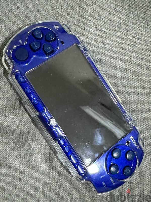 psp 2000 with 32gb 70 games navy with accessories 3