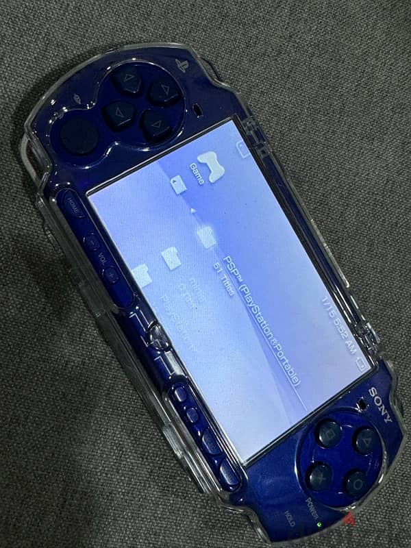 psp 2000 with 32gb 70 games navy with accessories 4