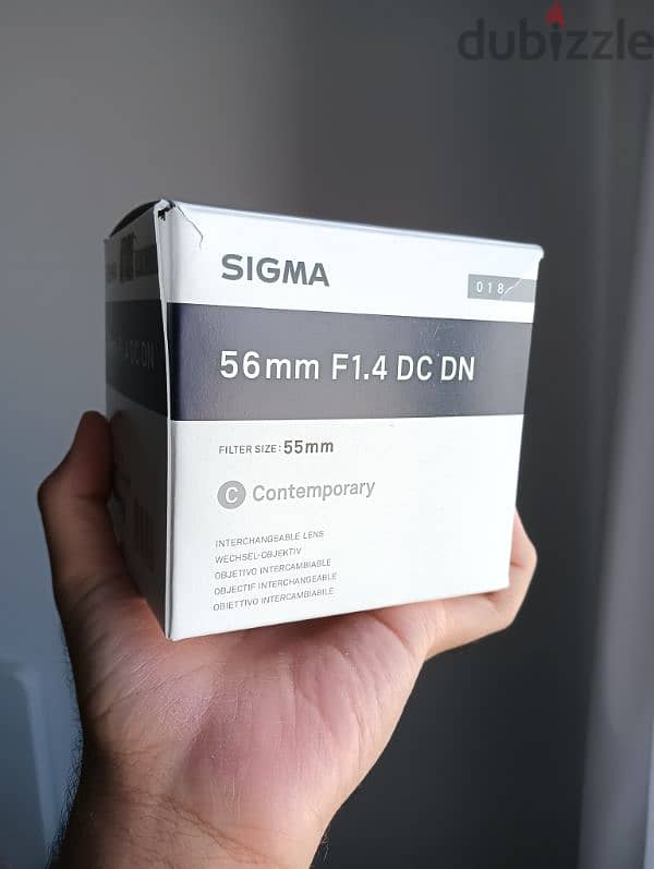 Sigma 56mm F1.4 used with box 1