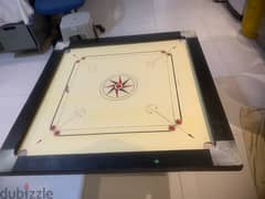 carrom bord with coins 0