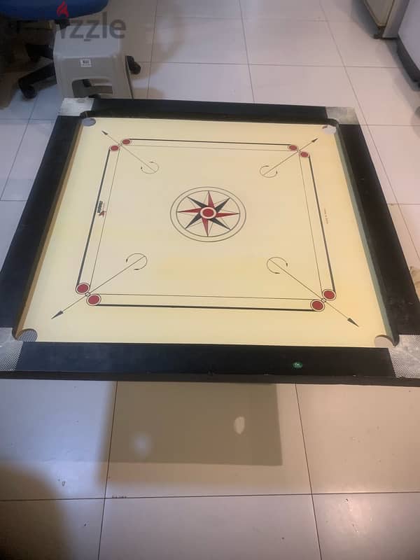 carrom bord with coins 1