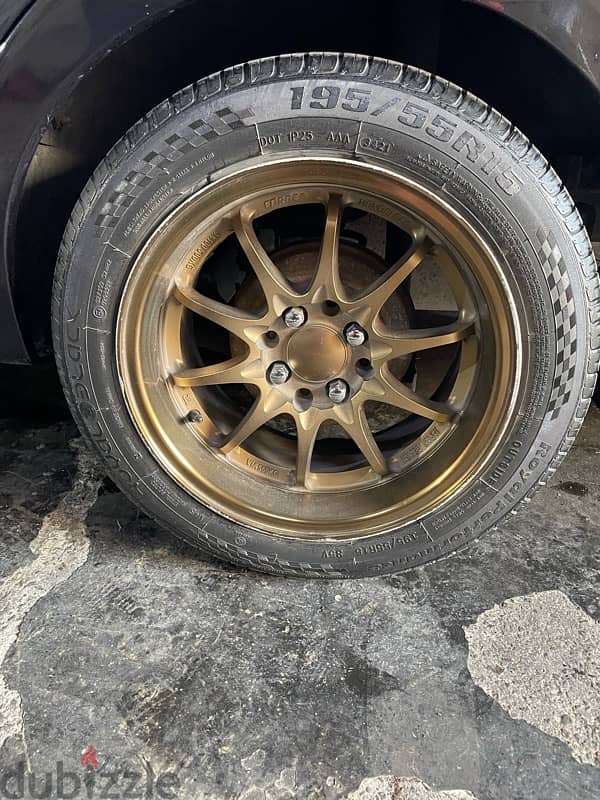 15 inch rims with tires 195/55R15 in an excellent condition for sale 1