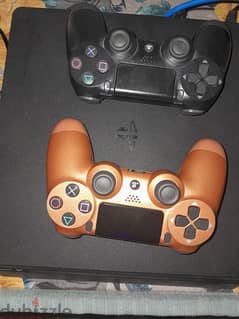 ps4 slim 1tb with 2 controller and 2CD 0