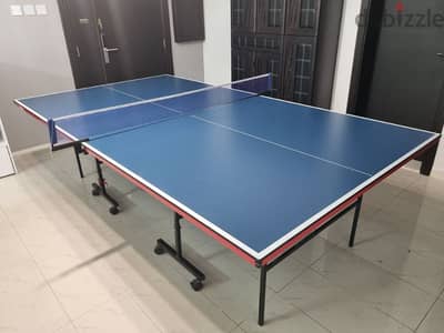 Table tennis board plus net and bats