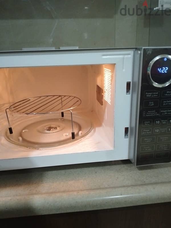 for sale clickon digital microwave oven 25L seme new condition 1