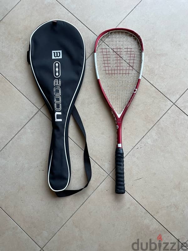 tennis rackets and ball basket 3