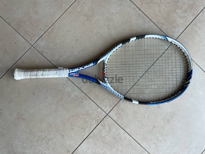 tennis rackets and ball basket 8