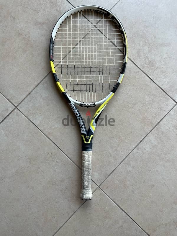 tennis rackets and ball basket 9