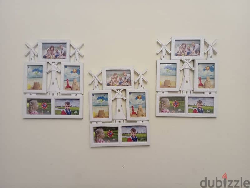 3 photo frame each with 5 photos brand new not used all for 12 BD 0