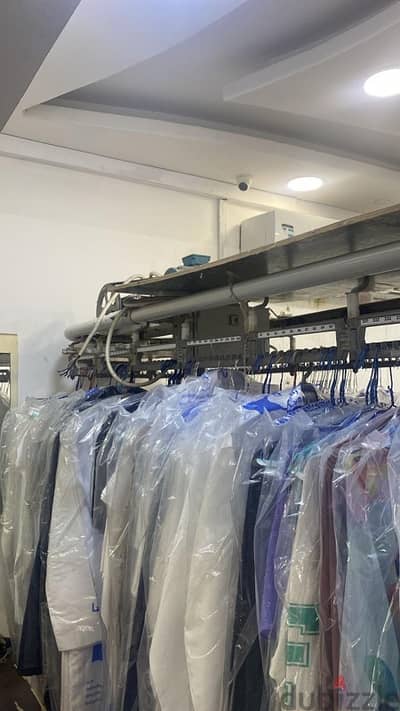 For Sale: Garment Conveyor System for Laundries - Excellent Condition