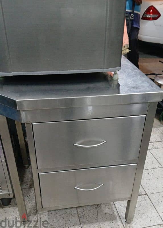 cash counter, wall box, small table, popcorn machine, display chiller 0