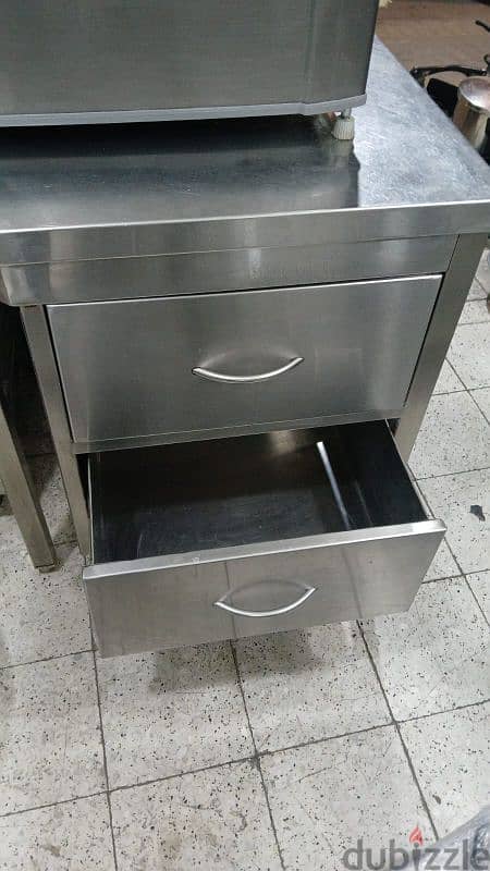 cash counter, wall box, small table, popcorn machine, display chiller 1