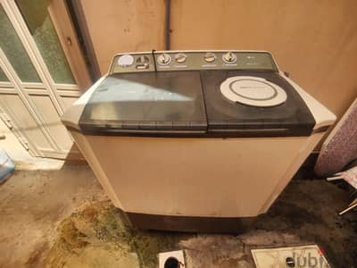 LG semi-automatic washing machine and dryer.