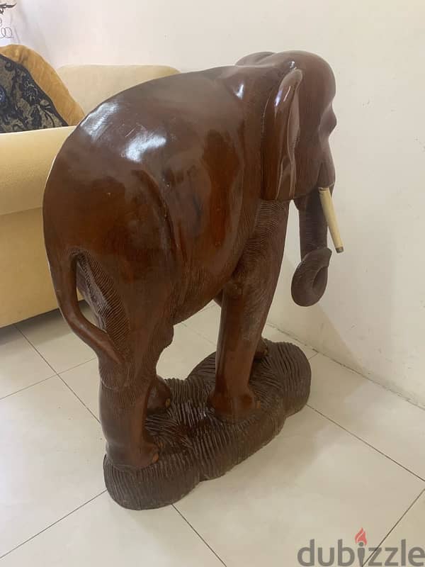 solid wooden elephant antic for house or garden 1