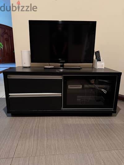 samsung TV and TV cabinet