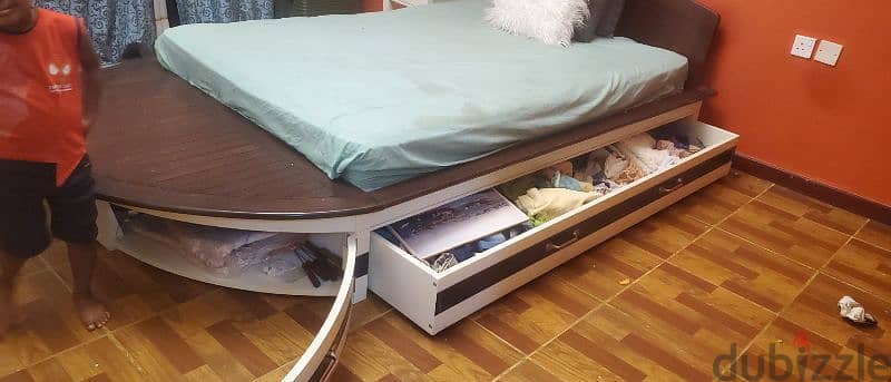 Bed with side table 0