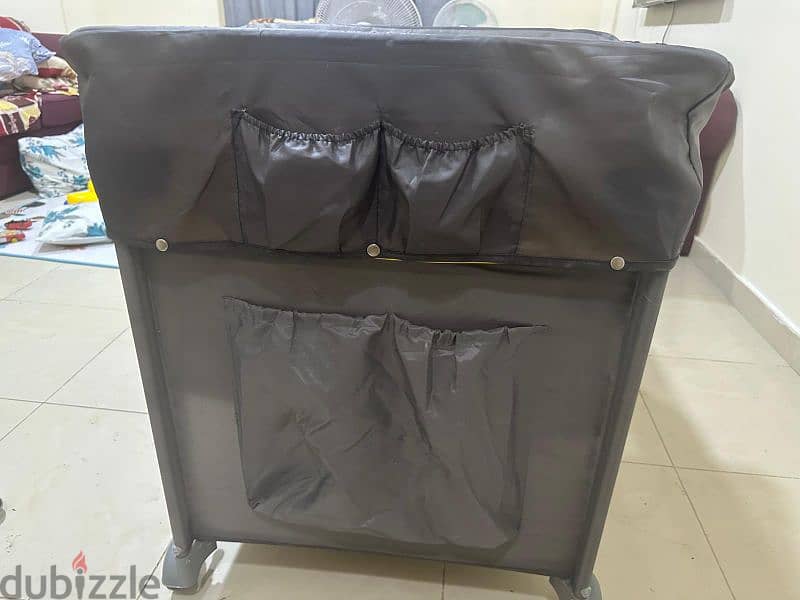 Baby cot with detachable diaper changing board and car seat 5