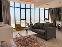 Amazing 2 BHK with a beautiful sea/city view for rent in seef district 0