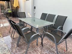 like new condition table with 8 chairs 0