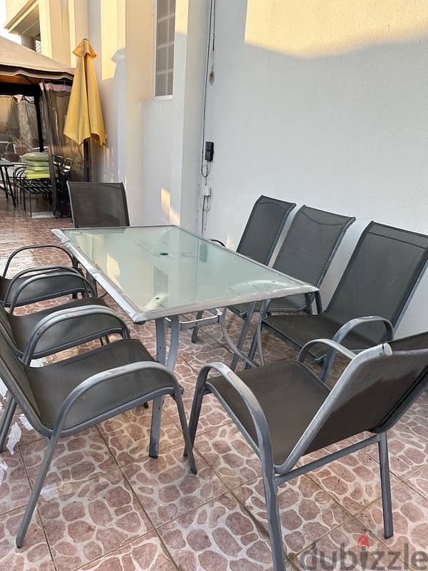 like new condition table with 8 chairs 2