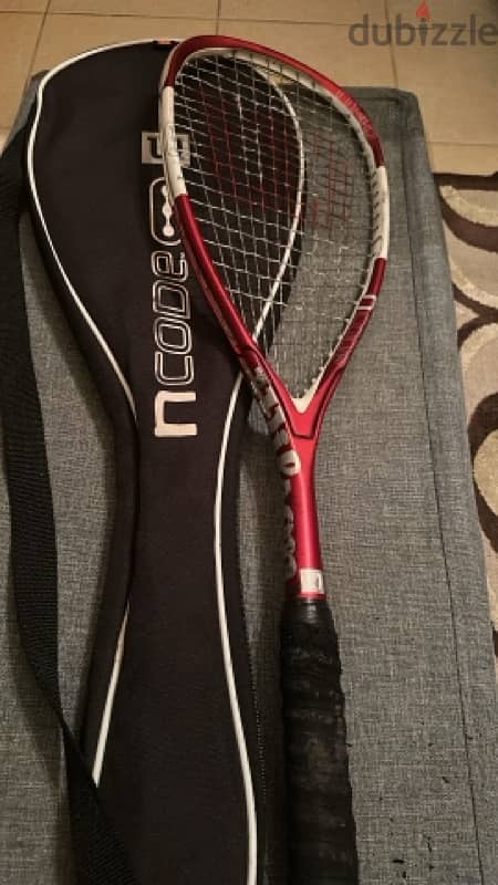 tennis rackets and ball basket 5