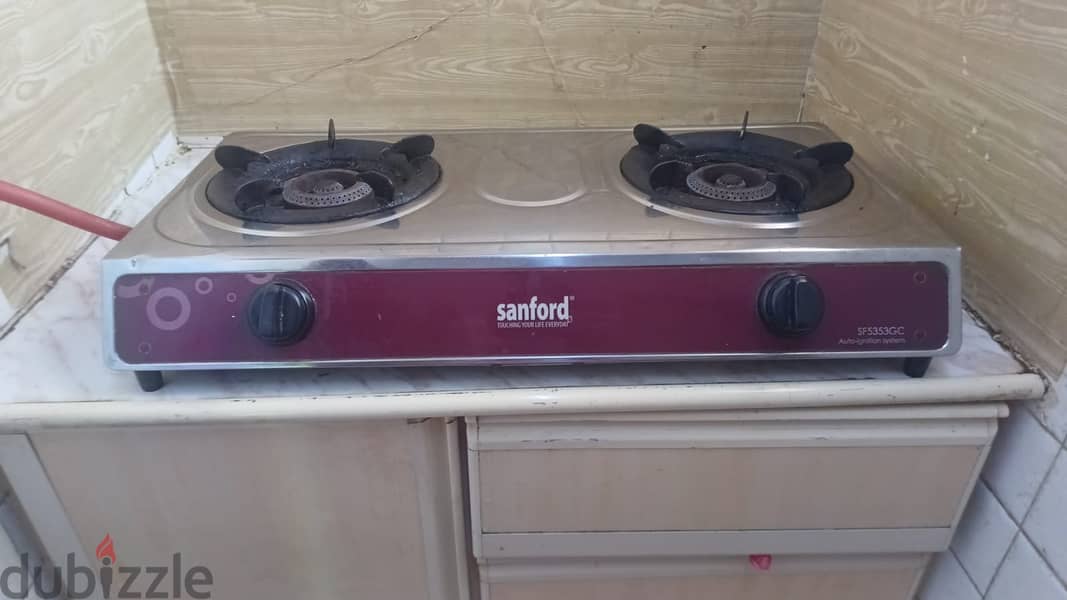 22 KG Gas Cylinder with Regulator and also Sanford 2-Burner Stove 2