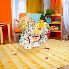 Bright Starts Playful Pinwheels Bouncer with vibration brand 0