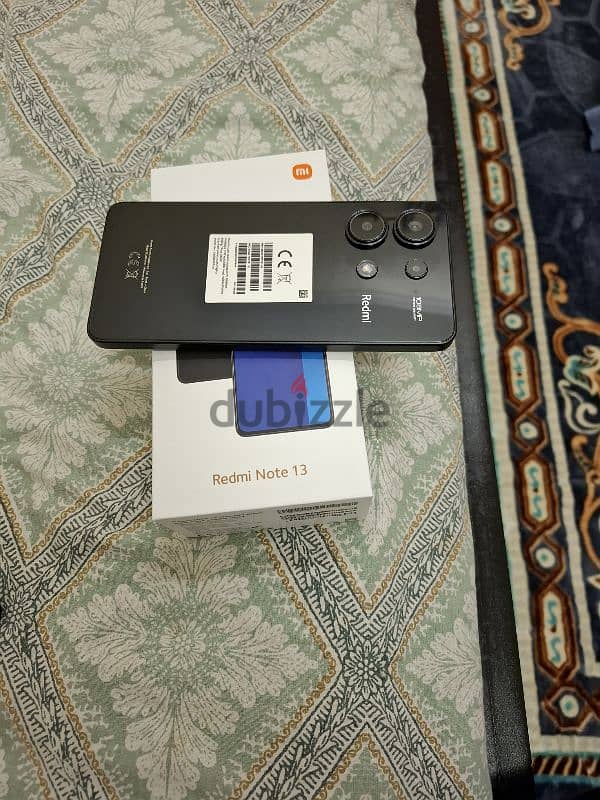 Redmi Note 13 same new 1 month used with 1 year warranty with Ashraff. 3