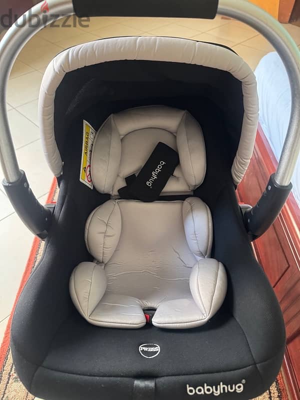 baby carrier + Car seat 1