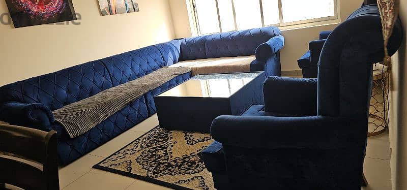 sofa set with big centre table carpet and small serving tables 2