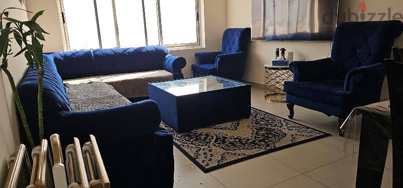 sofa set with big centre table carpet and small serving tables 3