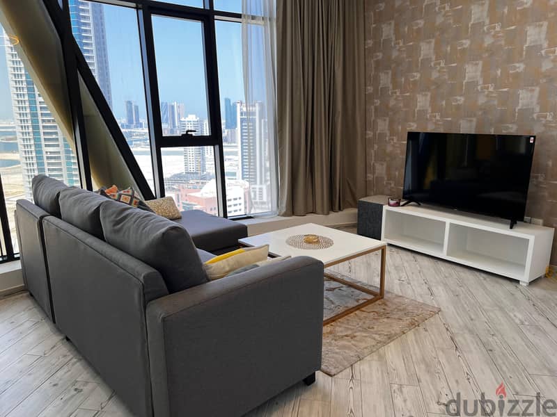 Beautiful Apartment with an Amazing Sea/City view in Seef 1