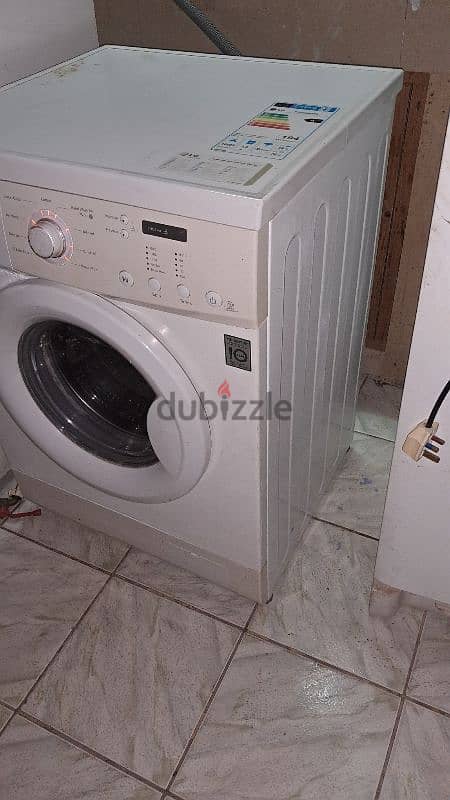 LG 7.0 kg fully outomatic wash Dry 5