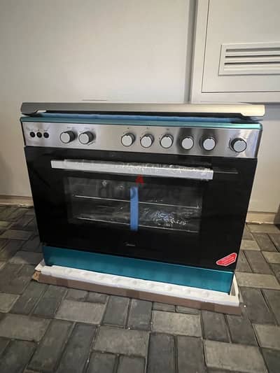 Midea Freestanding Cooker with 5 Gas Burner